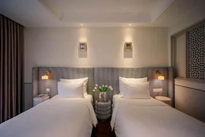 Chic Wing Twin Room — Le Jardin Hotel Haute Couture